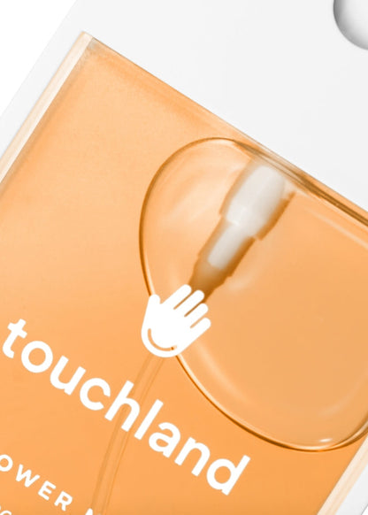 Orange packaging with a white hand icon and 'touchland' text on a white background