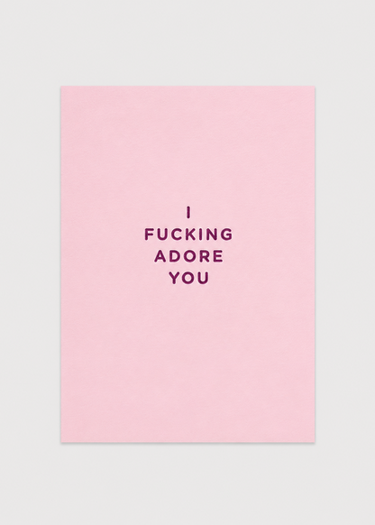 Pink card with black text 'I FUCKING ADORE YOU' on a light gray background