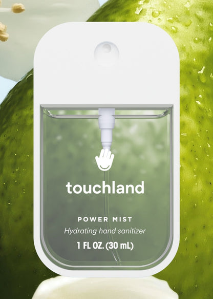 Touchland hand sanitizer power mist with green apple and flowers in the background