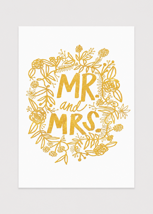 Gold 'MR and MRS' text with floral wreath on a white background