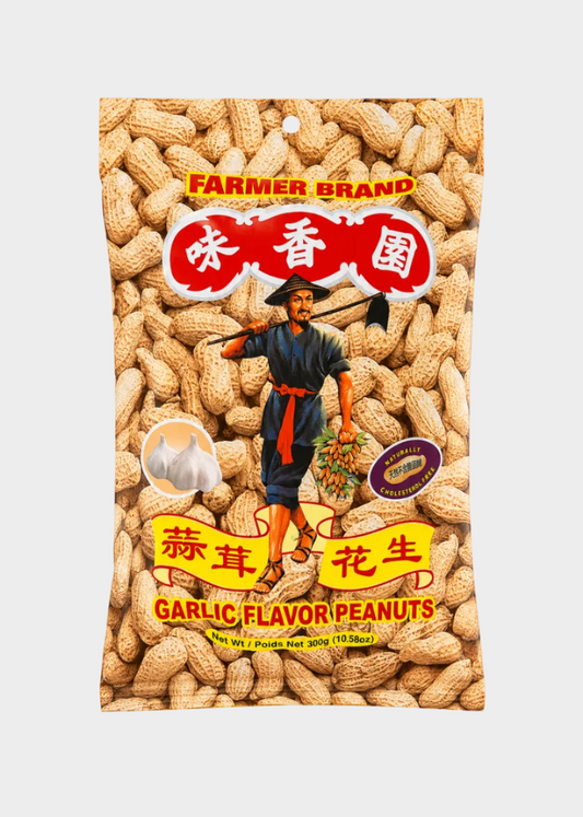 A bag of Farmer Brand Garlic Flavor Peanuts, featuring a graphic of peanuts filling the background, a traditional farmer illustration, and red and yellow text.