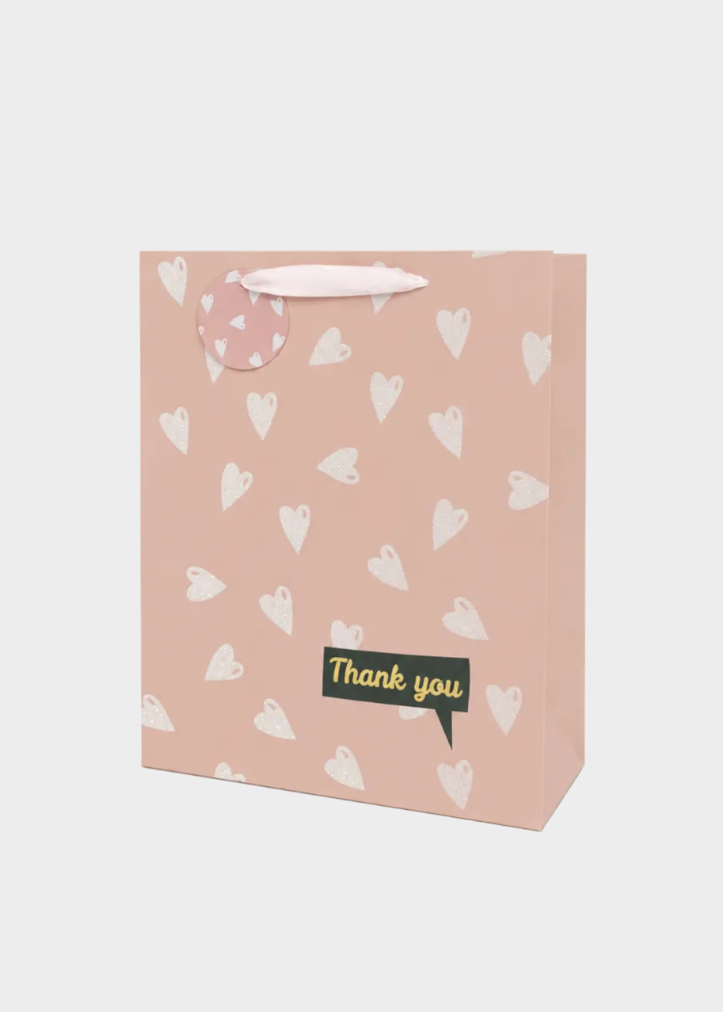 Gift bag with heart patterns and 'Thank you' text on a white background