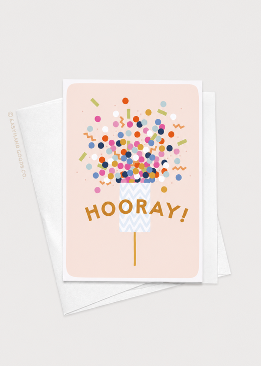 Greeting card with colorful confetti balloons and 'Hooray!' text on a light pink background.
