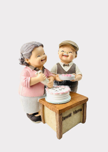 Grandparents Making Cake Figurine
