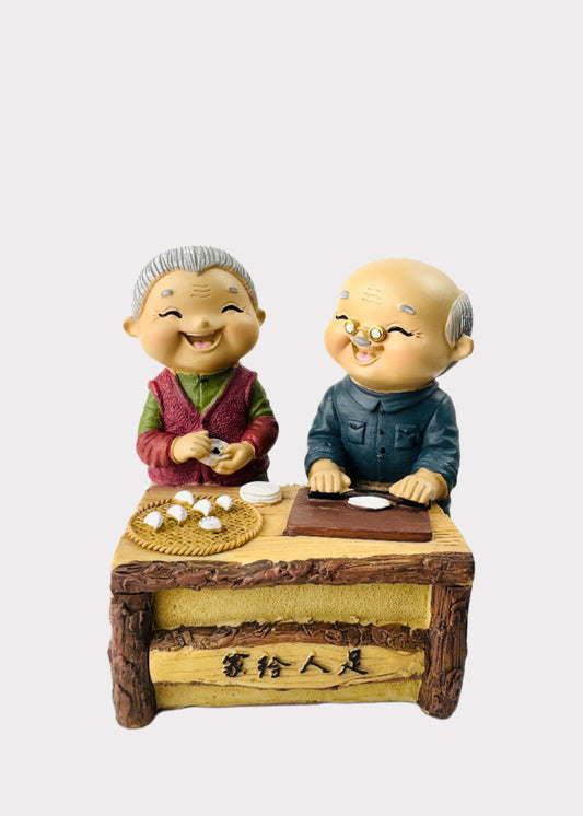 Grandparents Making Dumplings Figurine