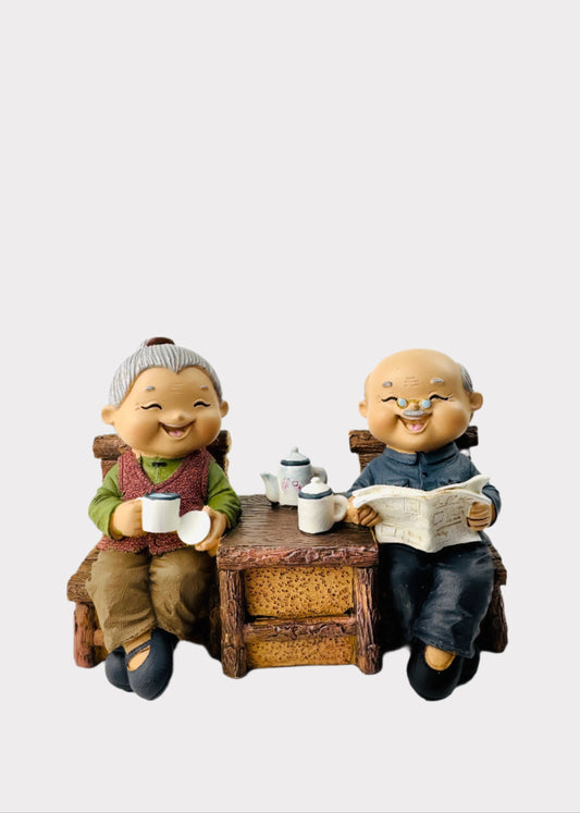 Grandparents Sharing Tea Figurine