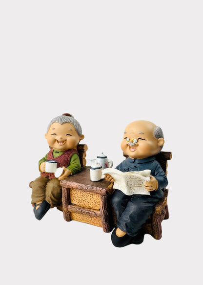Grandparents Sharing Tea Figurine