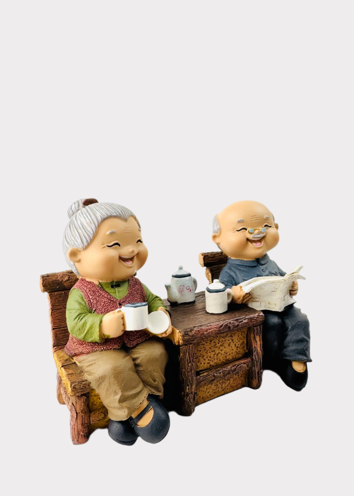 Grandparents Sharing Tea Figurine