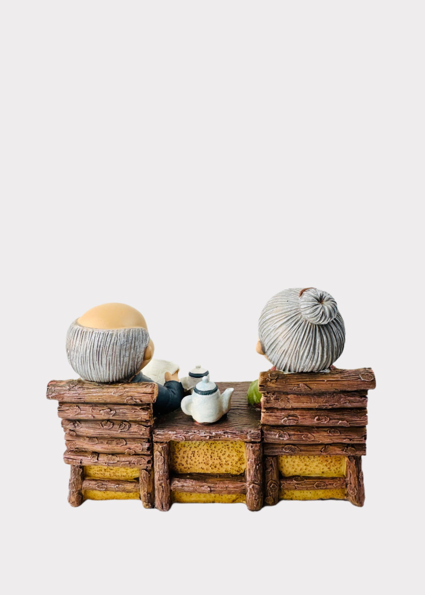 Grandparents Sharing Tea Figurine