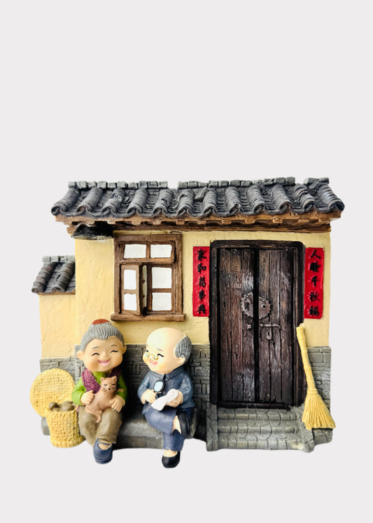 Grandparents on Front Porch Figurine