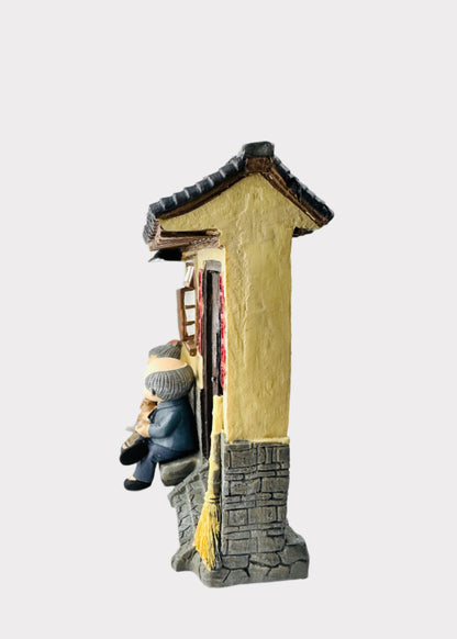 Grandparents on Front Porch Figurine