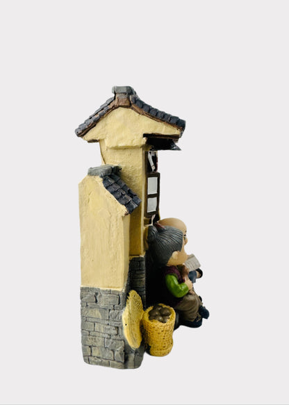 Grandparents on Front Porch Figurine