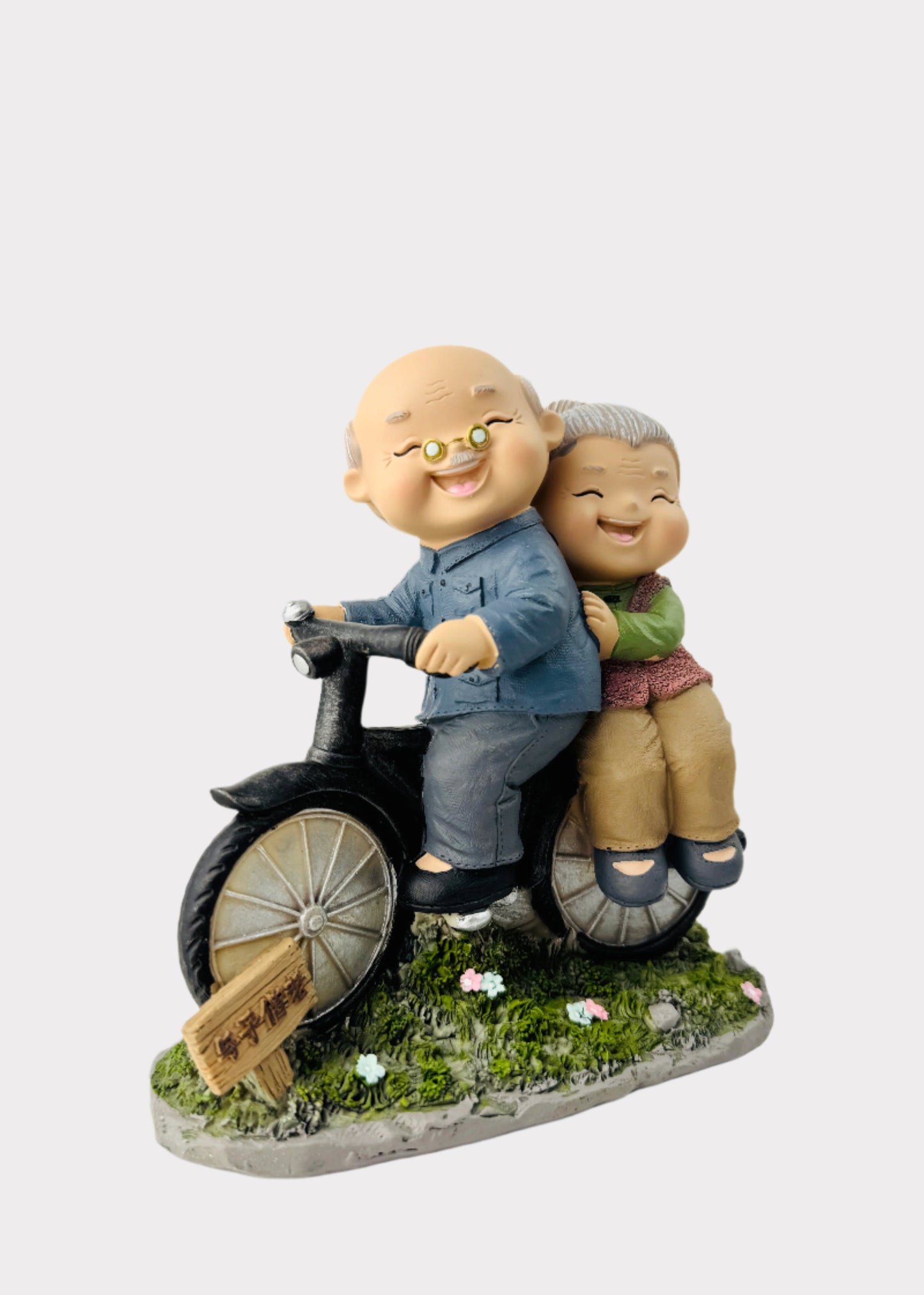 Grandparents Riding Bicycle Figurine