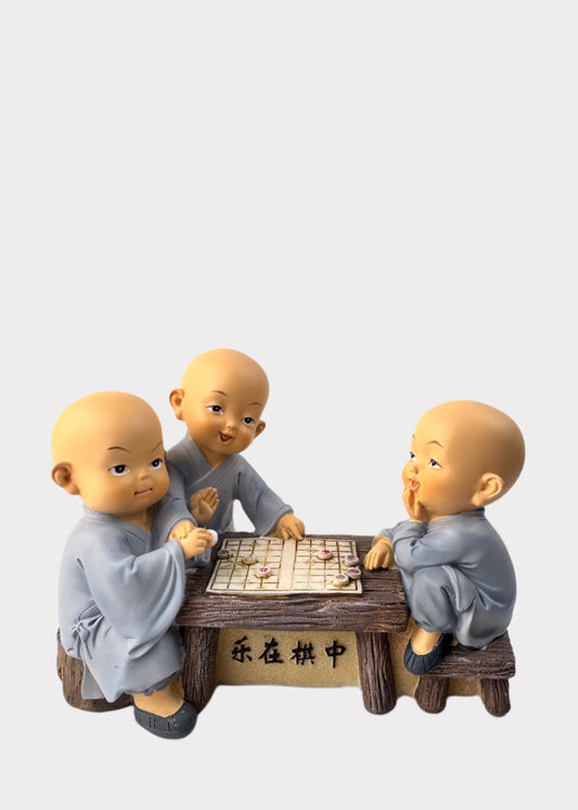 Little Monks Playing Chess Figurine