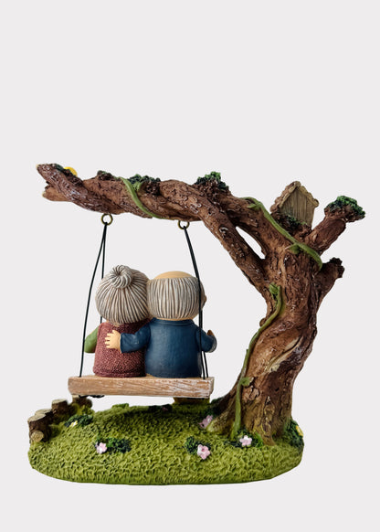 Grandparents on Garden Swing Figurine