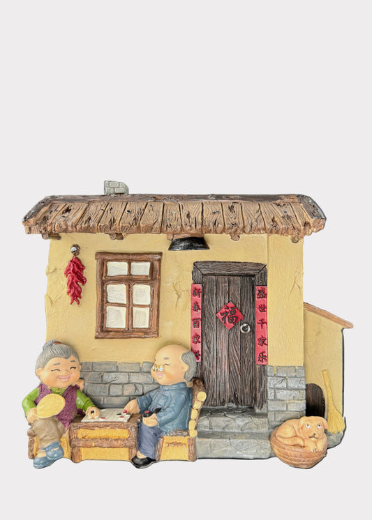 Grandparents Playing Chess  Village House Figurine