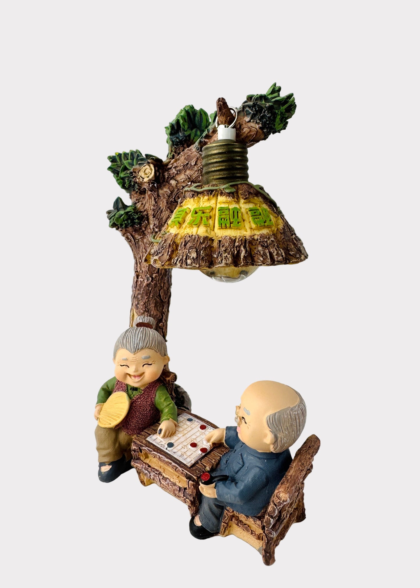 Grandparents Playing Chess Under Tree Lamp Figurine