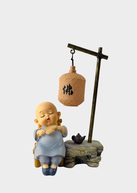 Sleeping Monk with Fan and Teapot Under Lantern