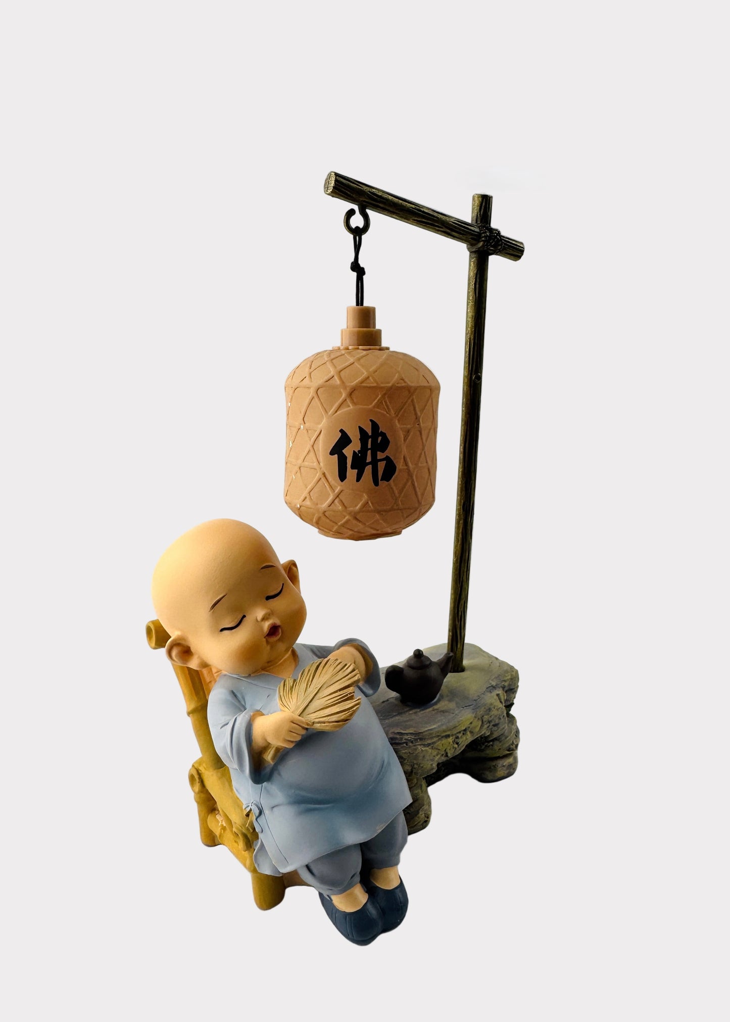 Sleeping Monk with Fan and Teapot Under Lantern