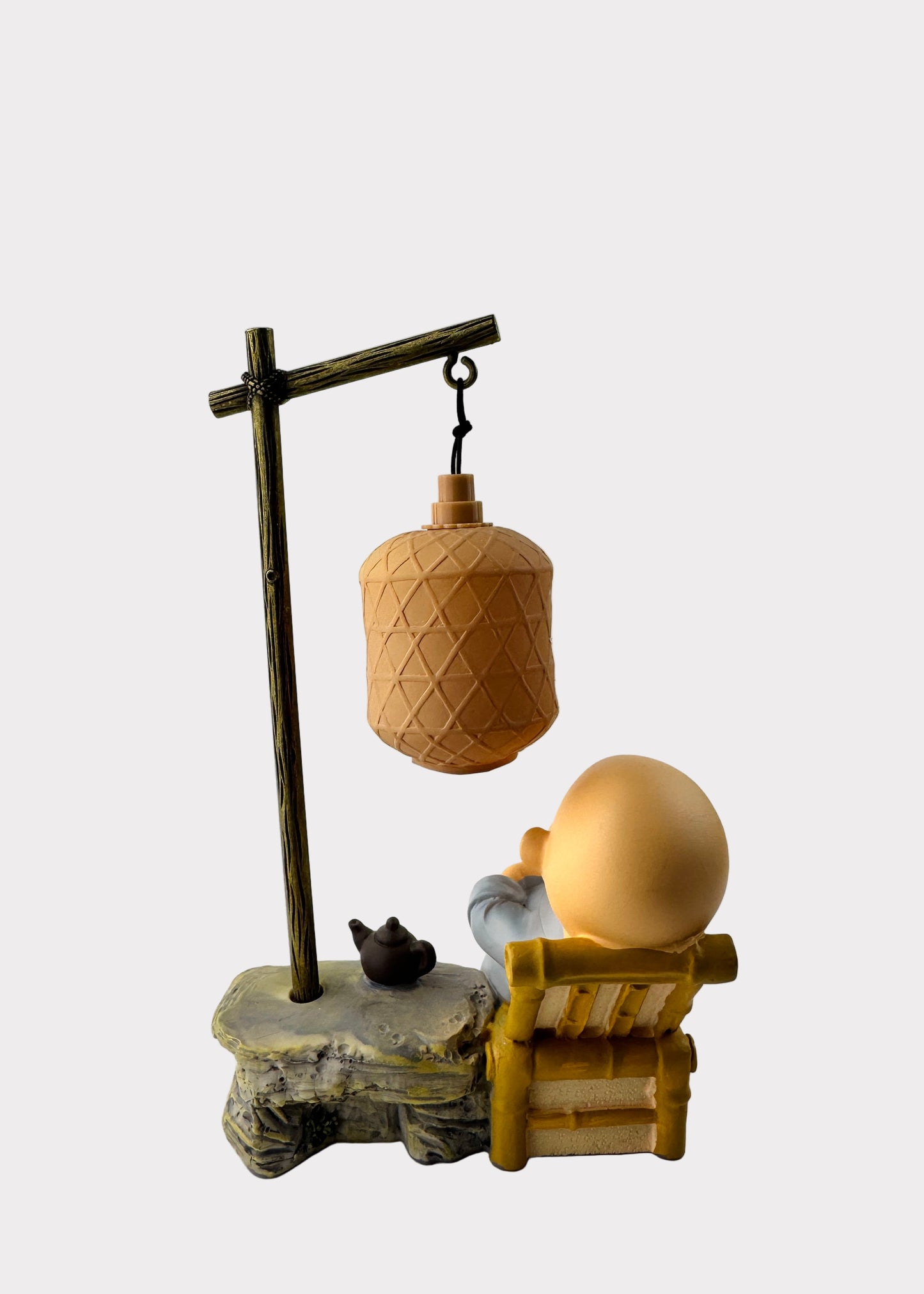 Sleeping Monk with Fan and Teapot Under Lantern