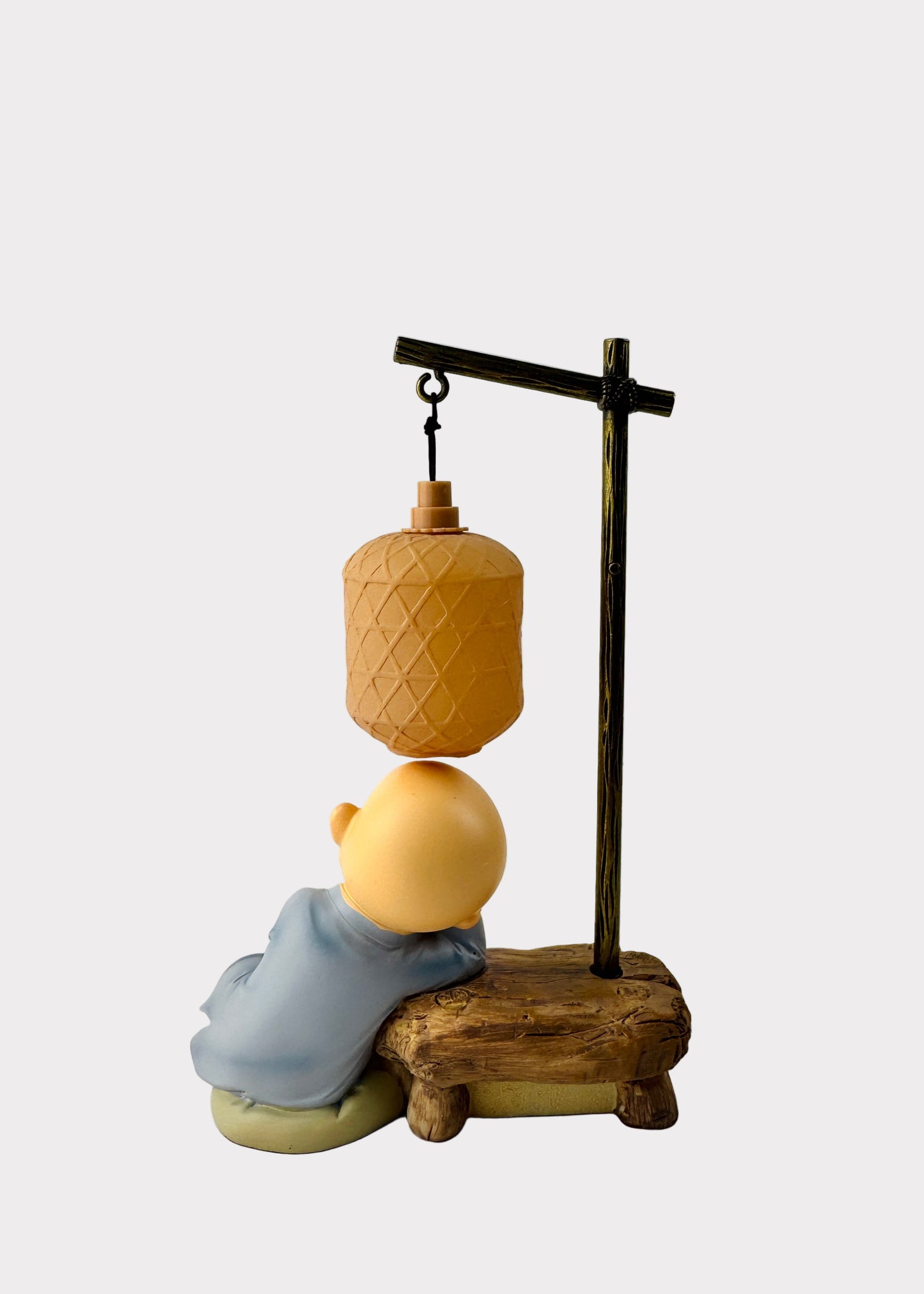 Sleeping Monk Figurine with Book and Lantern
