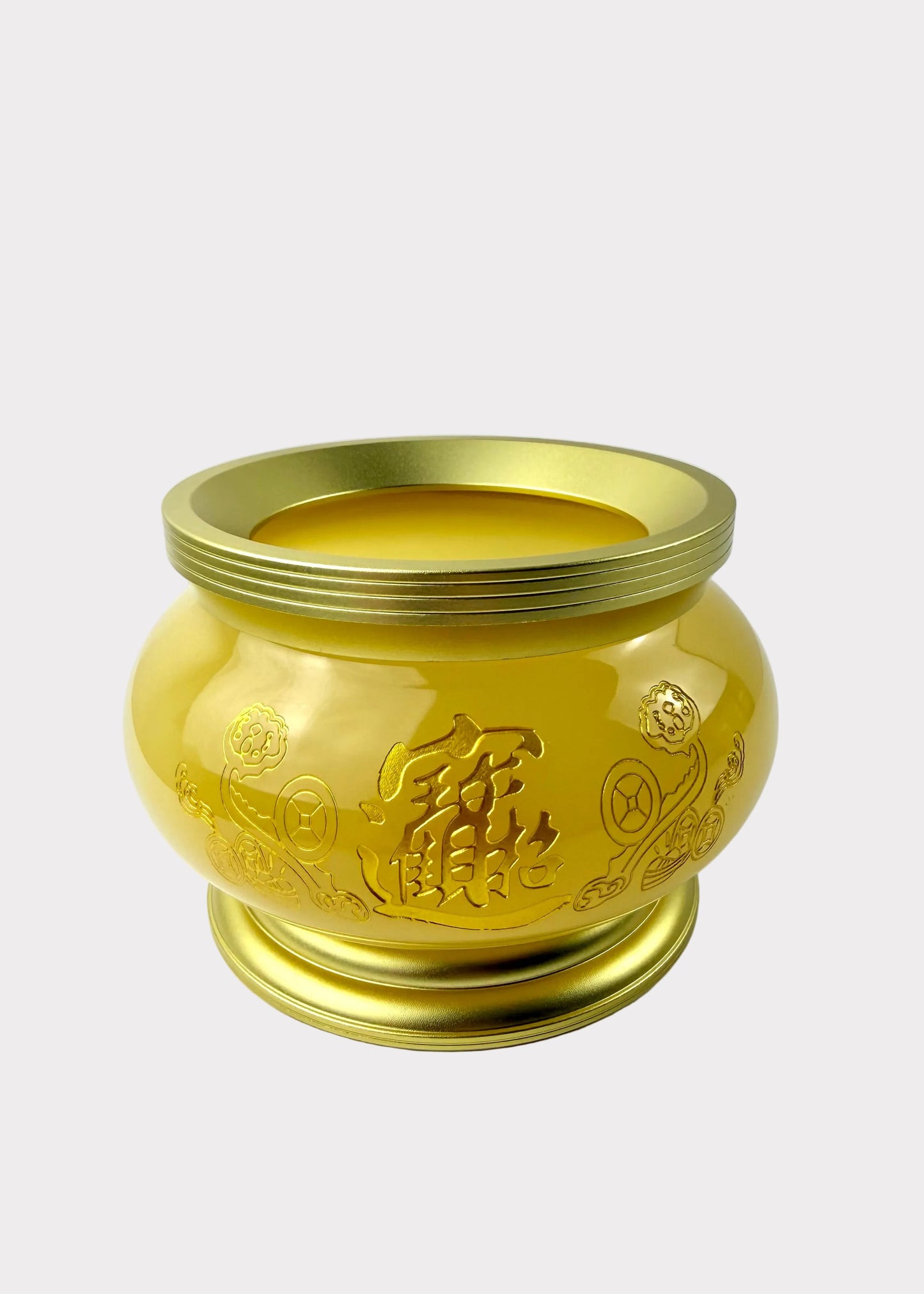 A shiny gold-colored metal incense burner with engraved Chinese characters and floral patterns, set against a plain white background.