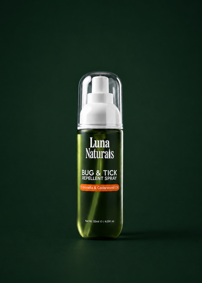 Luna Naturals bug & tick repellent spray bottle on a dark green background
