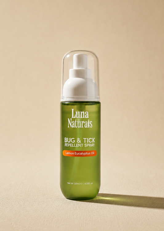 Luna Naturals bug & tick repellent spray bottle on a beige background