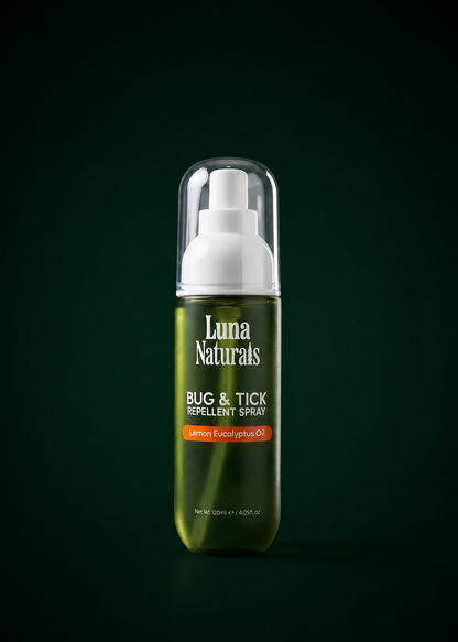 Luna Naturals bug & tick repellent spray bottle on a dark background