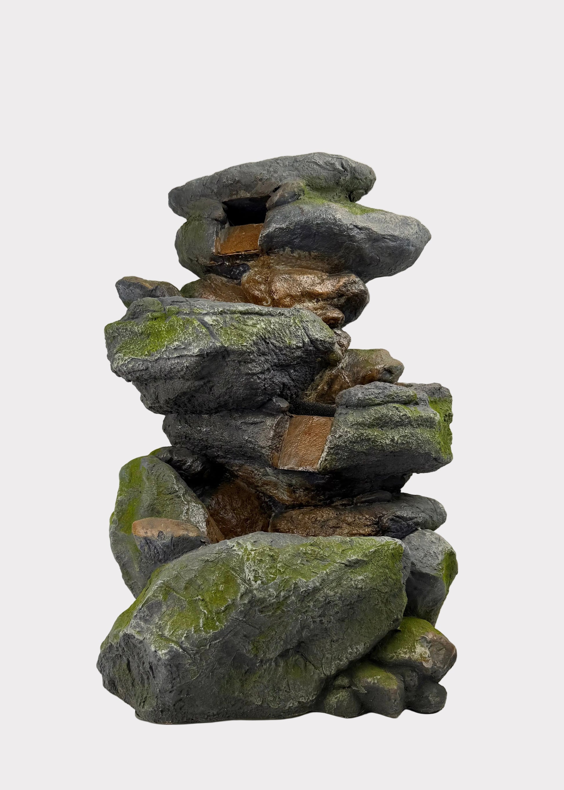 Stack of stacked stones with moss on a white background