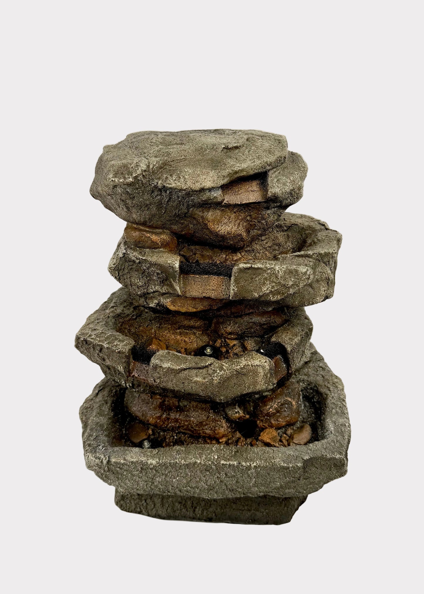 Stacked stone fountain on a white background