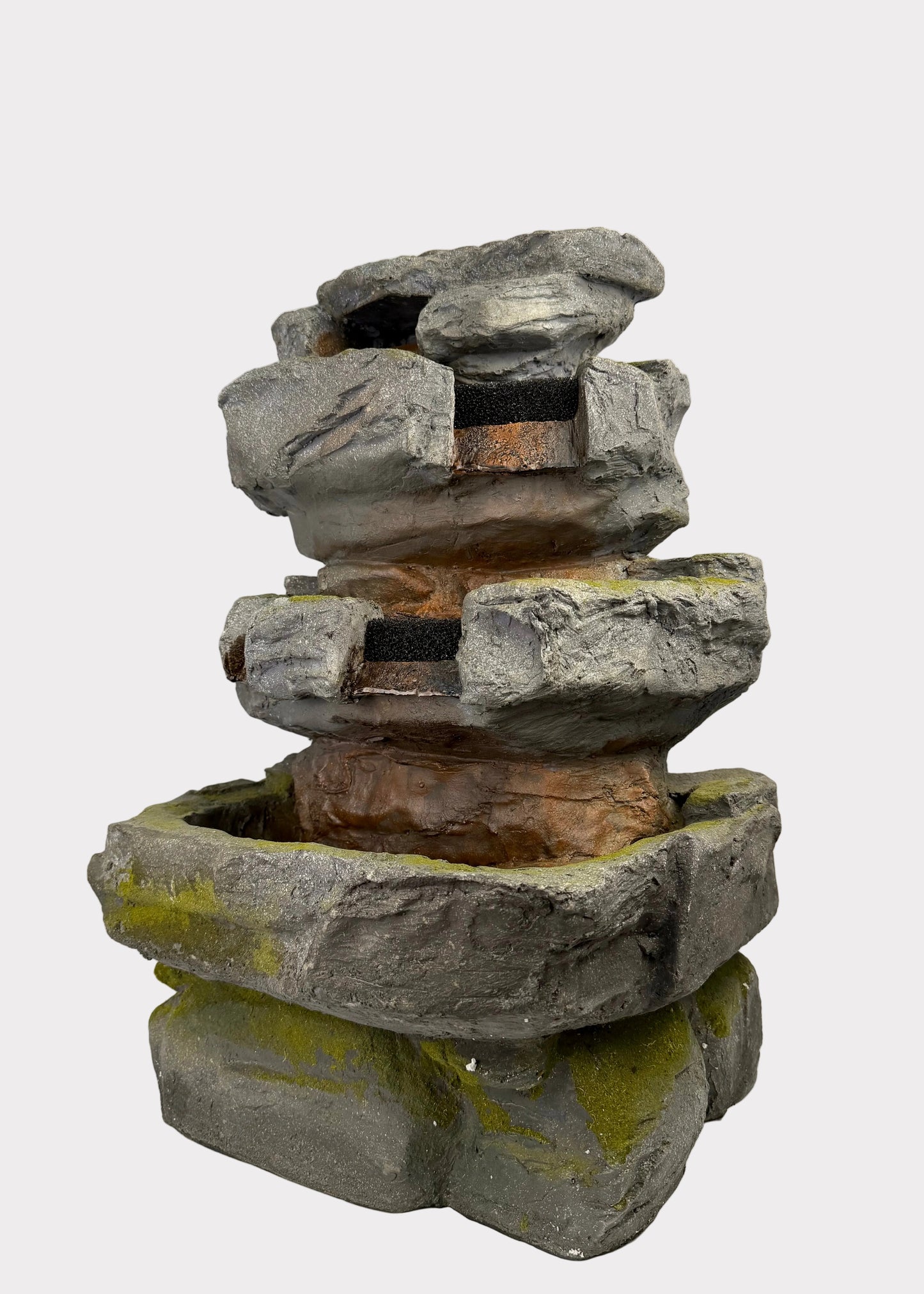 Stacked stone fountain on a white background