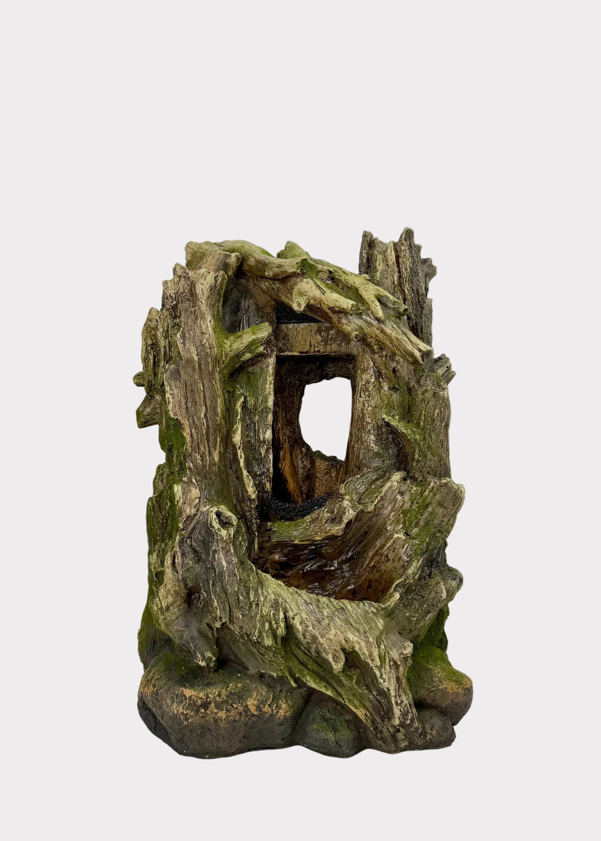Decorative piece resembling a natural wood structure with moss on a white background