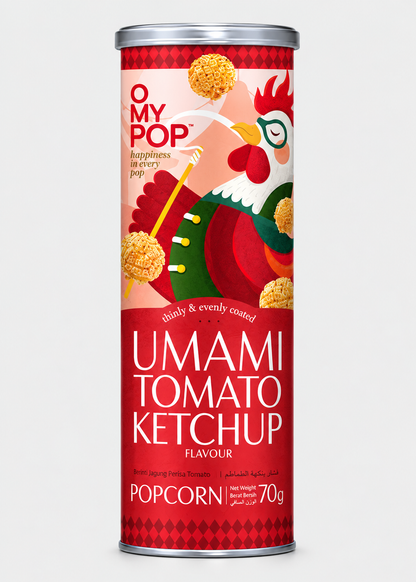 A tall cylindrical canister of Umami Tomato Ketchup Flavour Popcorn, featuring a red and pink label with an illustration of a rooster holding a ketchup bottle and popcorn kernels, on a light gray background.
