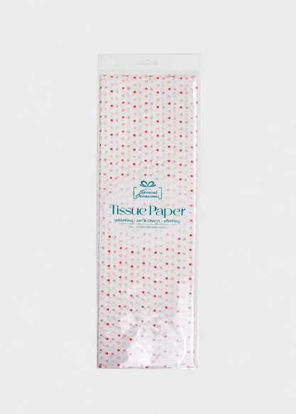 Pack of tissue paper with red hearts on a white background