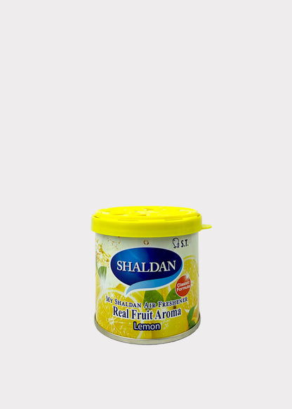 A canister of Shaldan Lemon Natural and Freshly Squeezed Real Fruit Aroma candle wax, featuring a bright yellow lid and a white label with lemon illustrations.