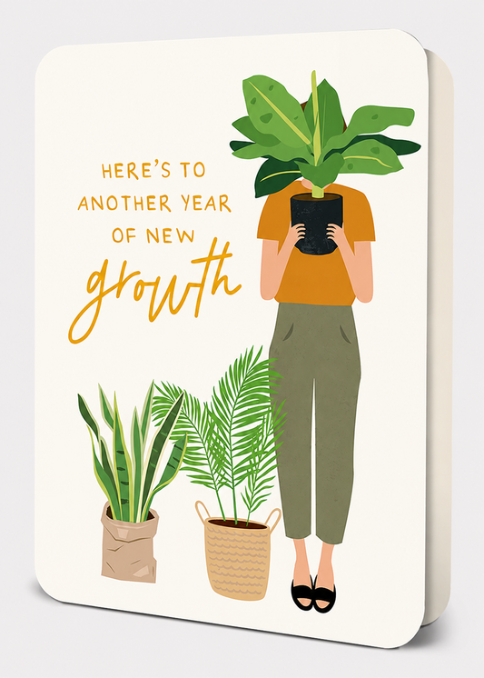 Notebook cover with illustration of a person holding a plant, surrounded by plants, with text 'Here's to another year of new growth'.