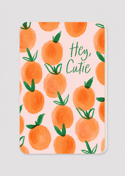 Card with orange pattern and 'Hey, Cutie' text on a pink background