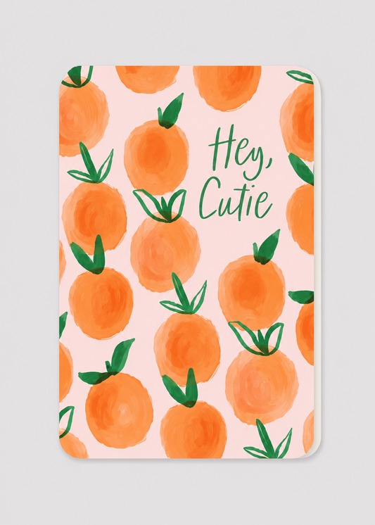 Card with orange pattern and 'Hey, Cutie' text on a pink background