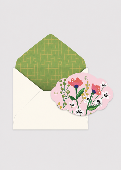 Floral card with a green envelope on a light gray background