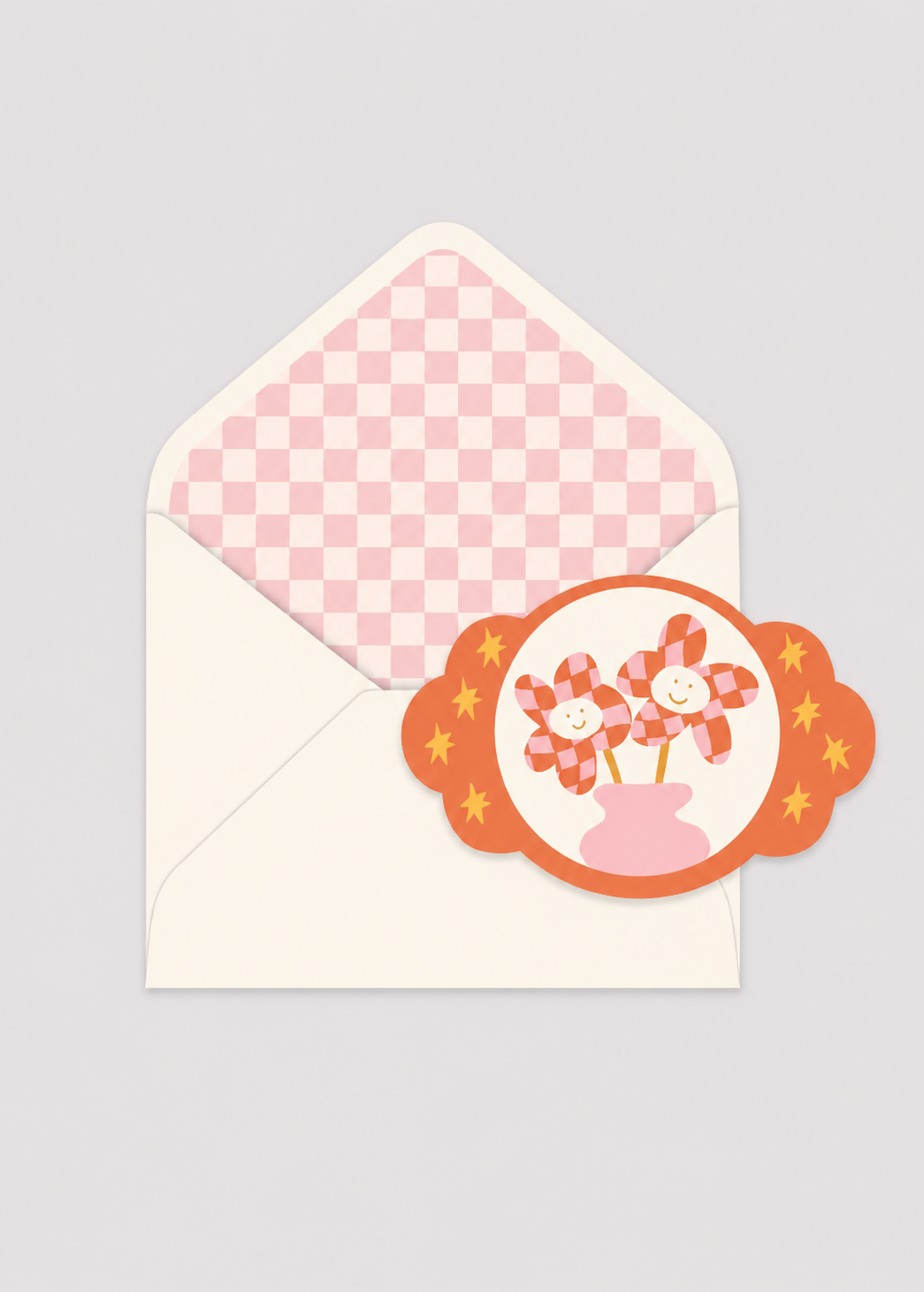 Envelopes with a decorative label featuring flowers on a light gray background