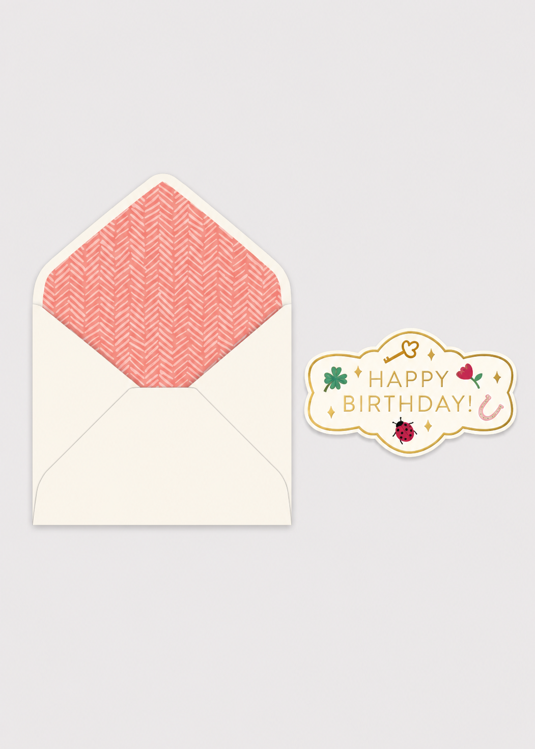Greeting card with 'Happy Birthday!' message and pink envelope on gray background