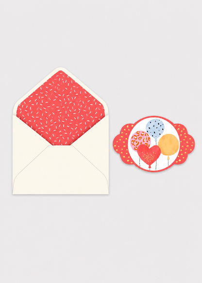 Card with envelope and heart-themed design on a light gray background