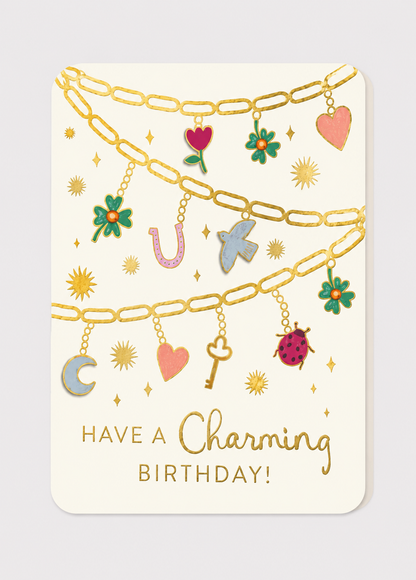Greeting card with gold chain and charms design, featuring the text 'Have a Charming Birthday!'.