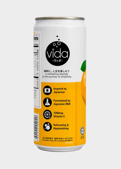 A 330ml aluminum beverage can from the brand vida, featuring a white upper half with black text and a bright yellow lower half with orange graphic accents, set against a plain light gray background.