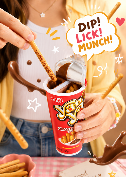 A person holds a red cup of Japanese chocolate stick snacks with a silver foil wrapper, while another hand inserts a chocolate-covered stick into the cup. The scene includes playful chocolate splashes, extra chocolate sticks, and a speech bubble that reads 'DIP! LICK! MUNCH!'.