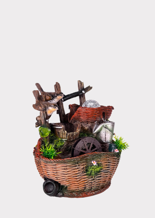 Bird-themed basket water fountain with crystal sphere – front view – Rainbow Rosemead