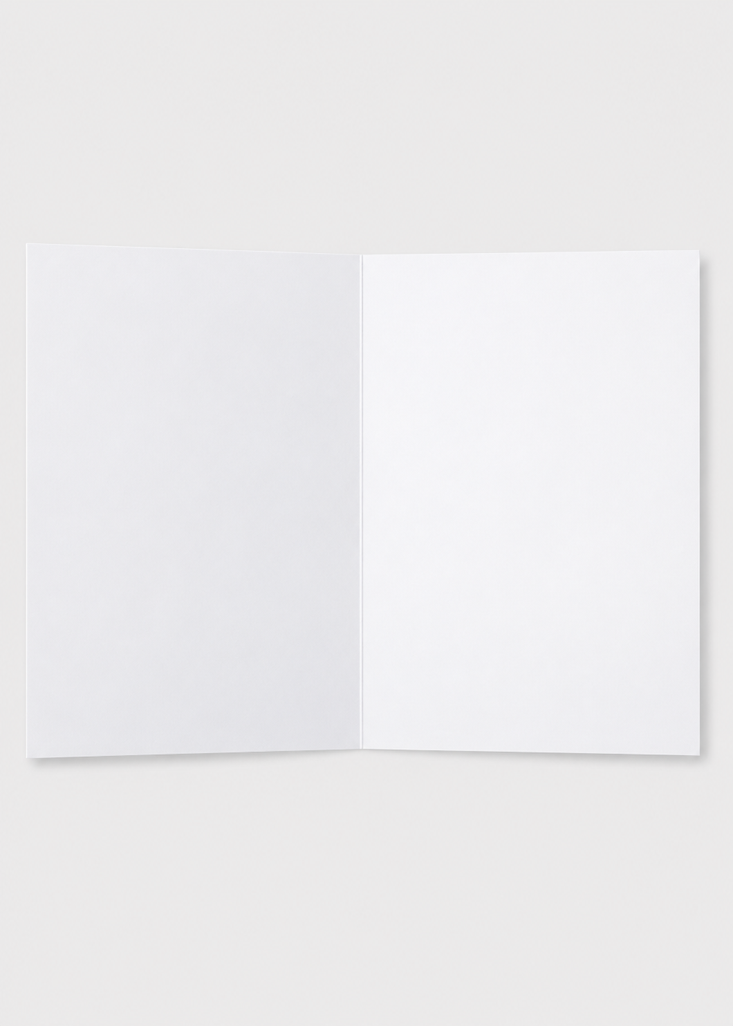Two white greeting cards on a light gray background