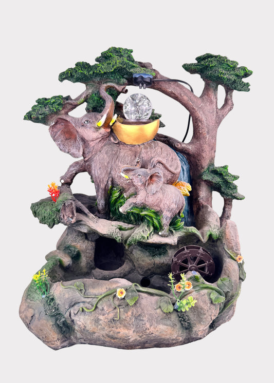 Forest elephant family fountain with LED crystal ball, tree design, and water wheel – front view - Rainbow Rosemead