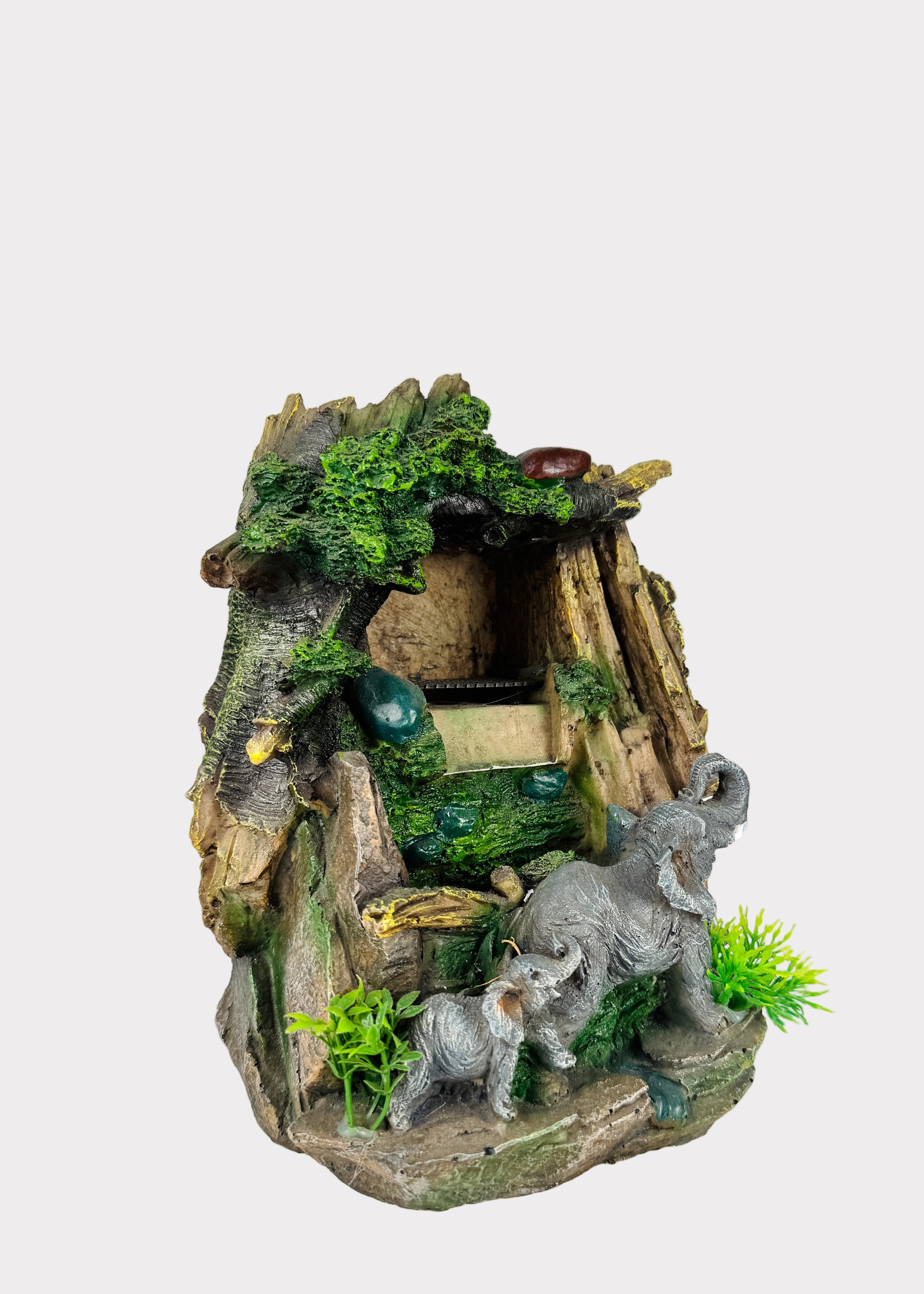 indoor water fountain with elephants